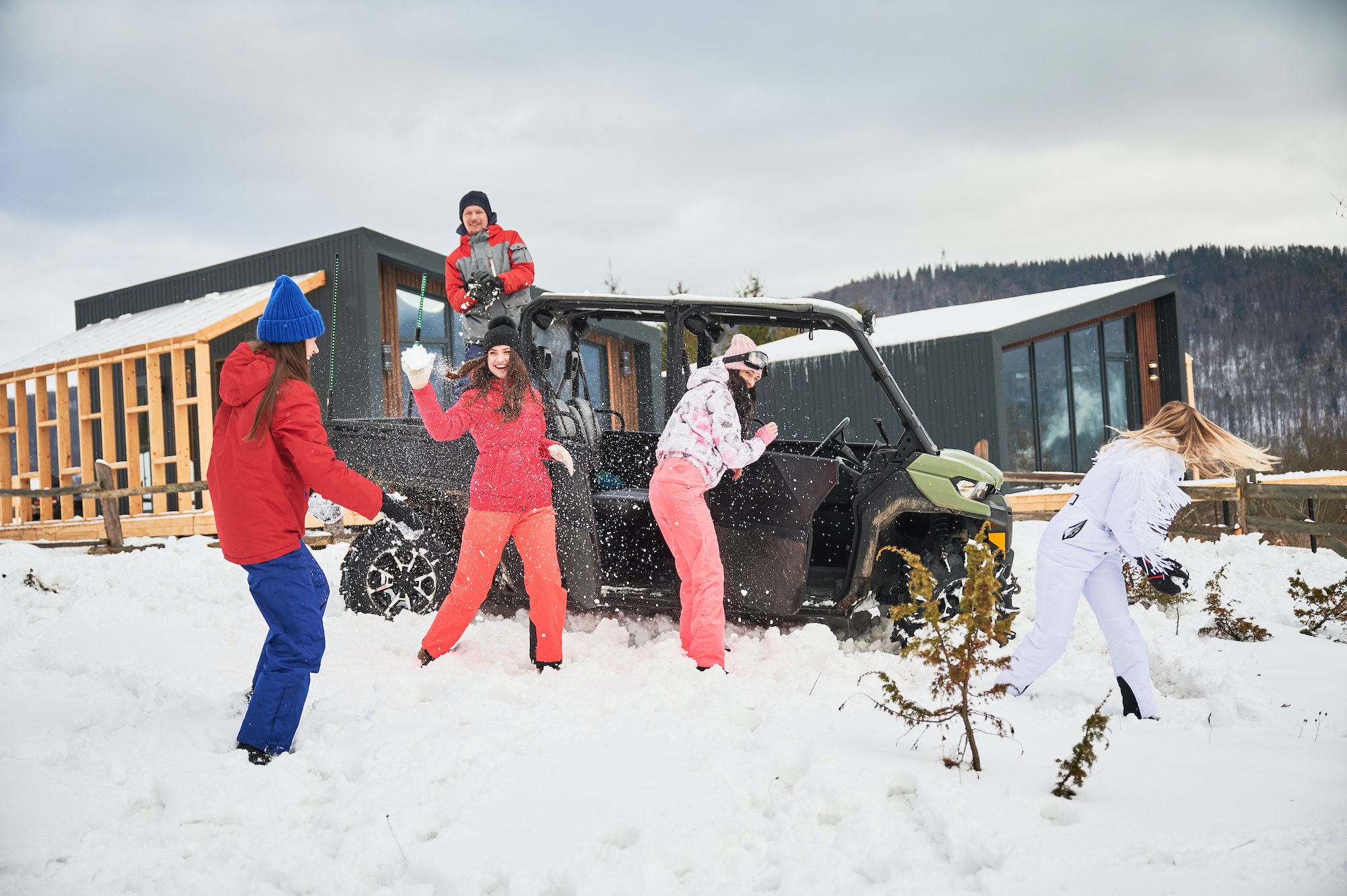 Happy women having fun in snow.